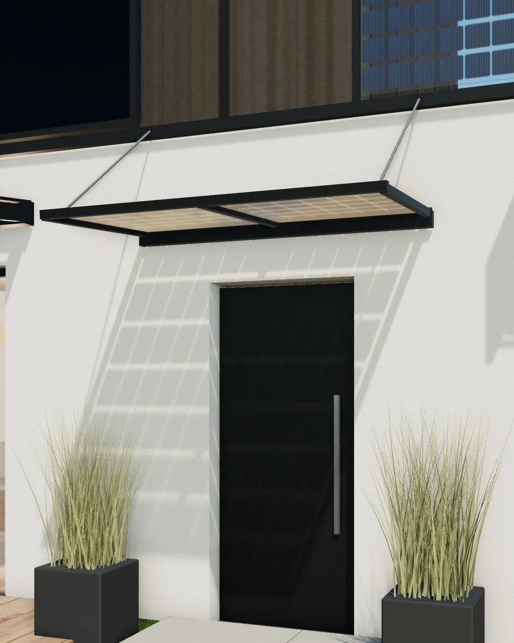 Auvent en verre solaire au-dessus d'une porte d'entrée.