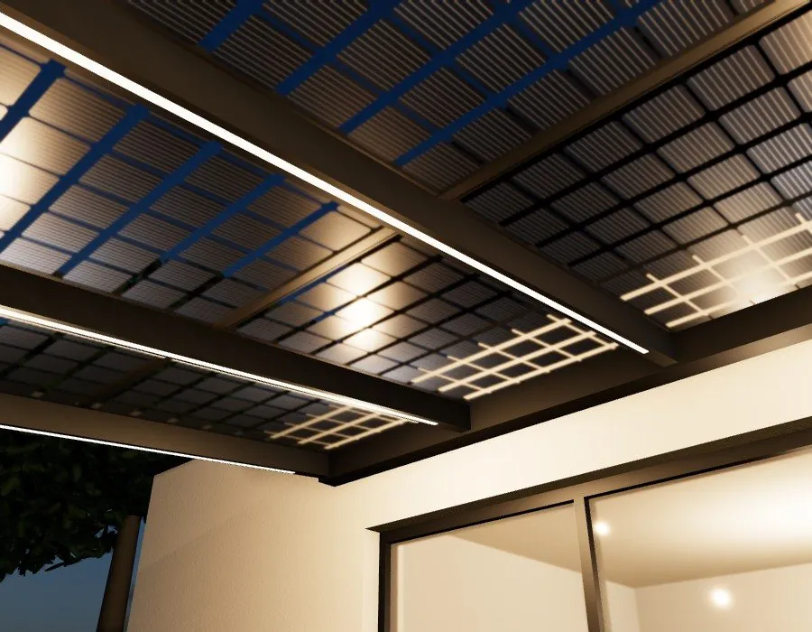 Rubans LED allumés sous les chevrons de la pergola, à la tombée de la nuit.
